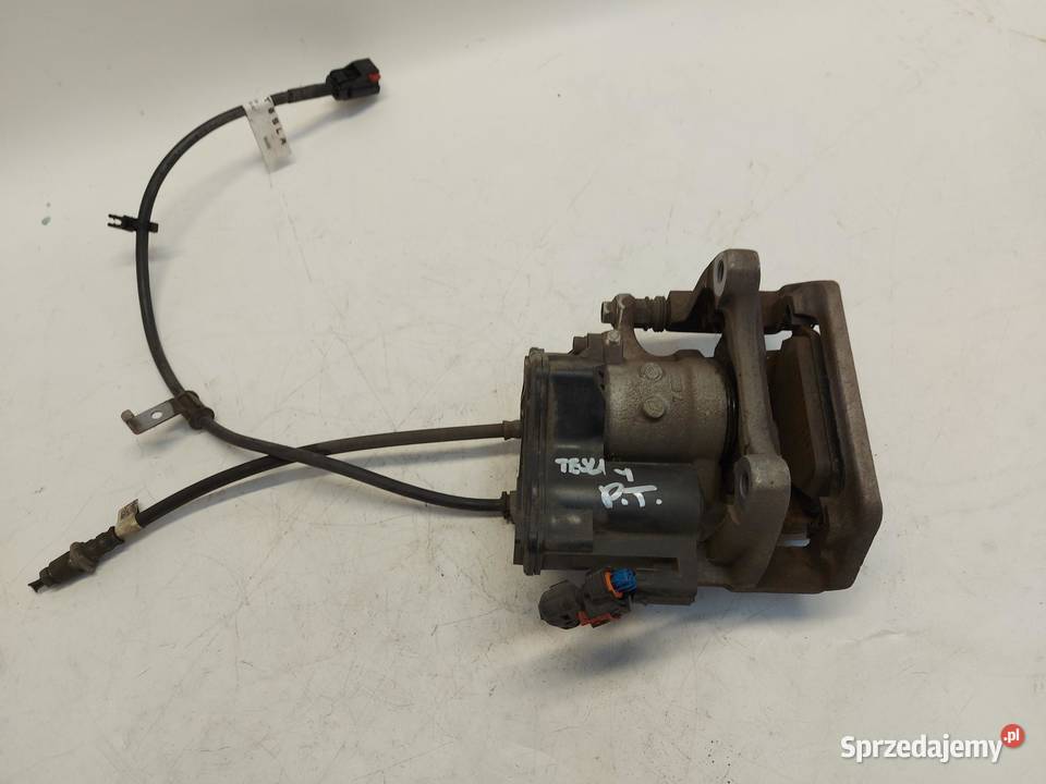 TESLA MODEL Y 2024r ZACISK HAMULCOWY PRAWY TYŁ dolnośląskie