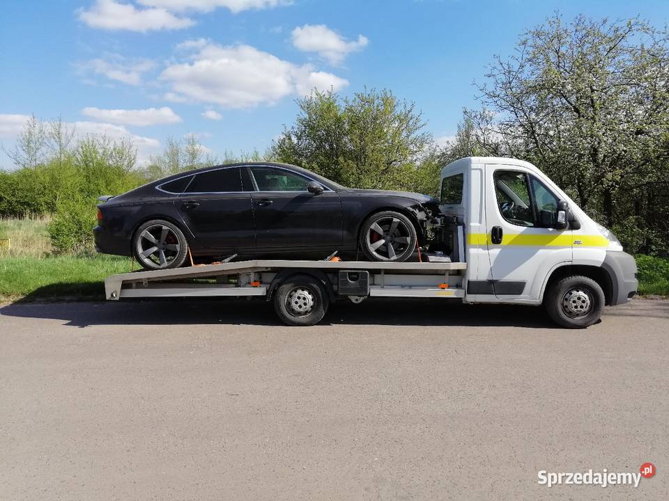 Pomoc drogowa Auto laweta Auto pomoc Tanio 247 usługa