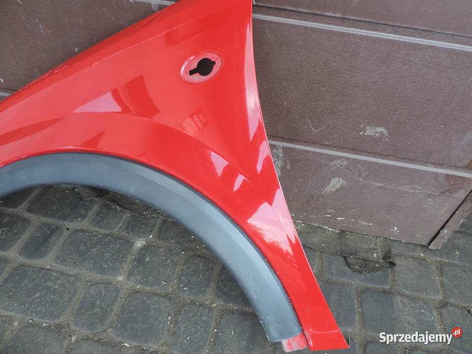 OPEL CORSA C FL BŁOTNIK LEWY PRZÓD Z573