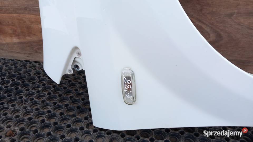 FIAT PUNTO EVO BŁOTNIK PRZÓD PRAWY 296A Zbierkowo