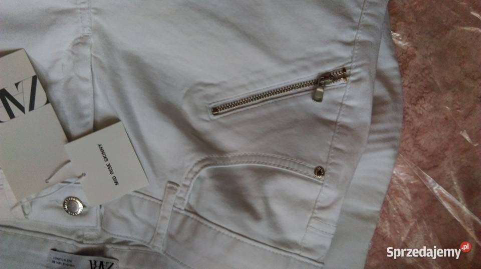 40 ZARABiałe spodnie rurki ze zdobieniem z Kraków