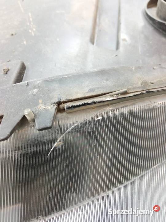 LAMPA PRZÓD PRAWA SOCZEWKA H7 EU USZKODZONA Saab