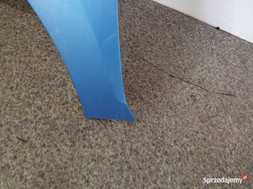 BŁOTNIK LEWY PRZÓD LQ5X LEKKO USZKODZONY Skoda