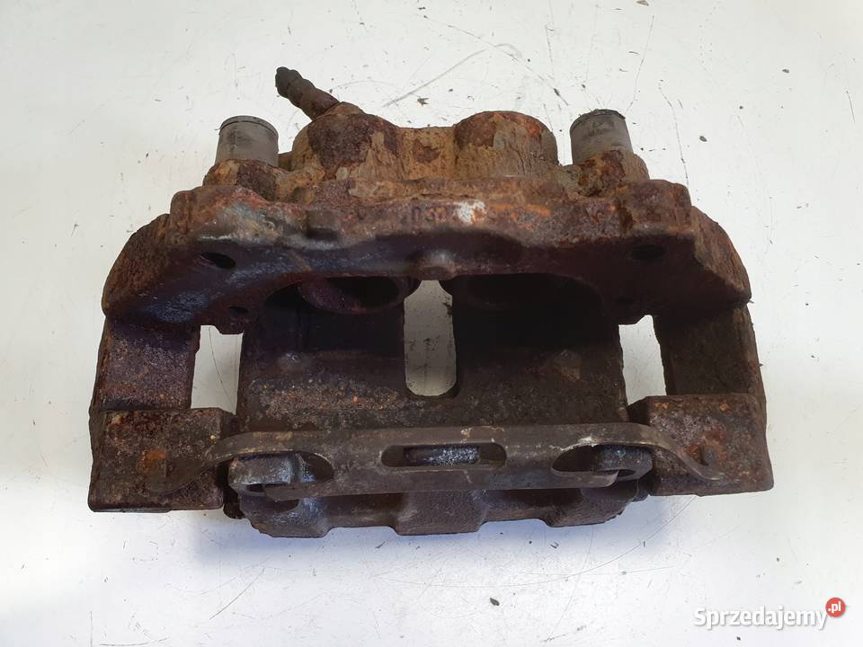 Volvo XC60 I PRZEDNI ZACISK HAMULCOWY lewy przód