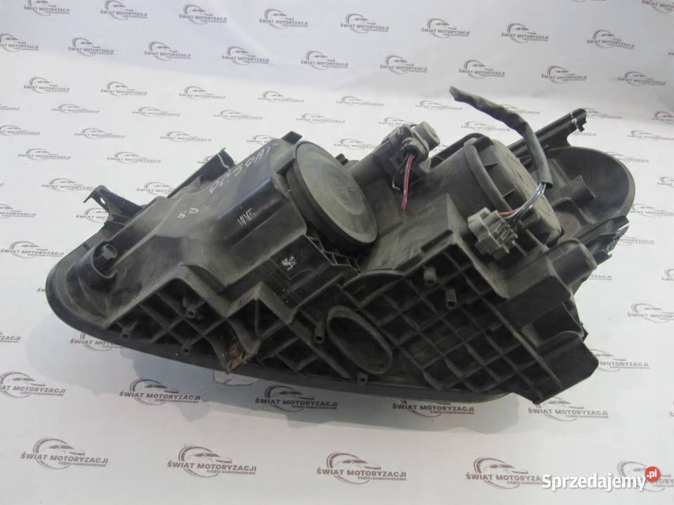 NISSAN QASHQAI I J10 LIFT 10r lampa prawa przód