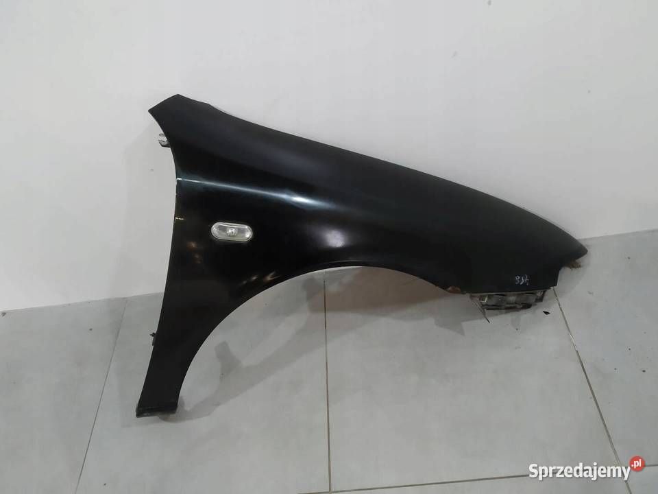 BŁOTNIK PRAWY PRZÓD CZARNY LEON I Seat Toledo II