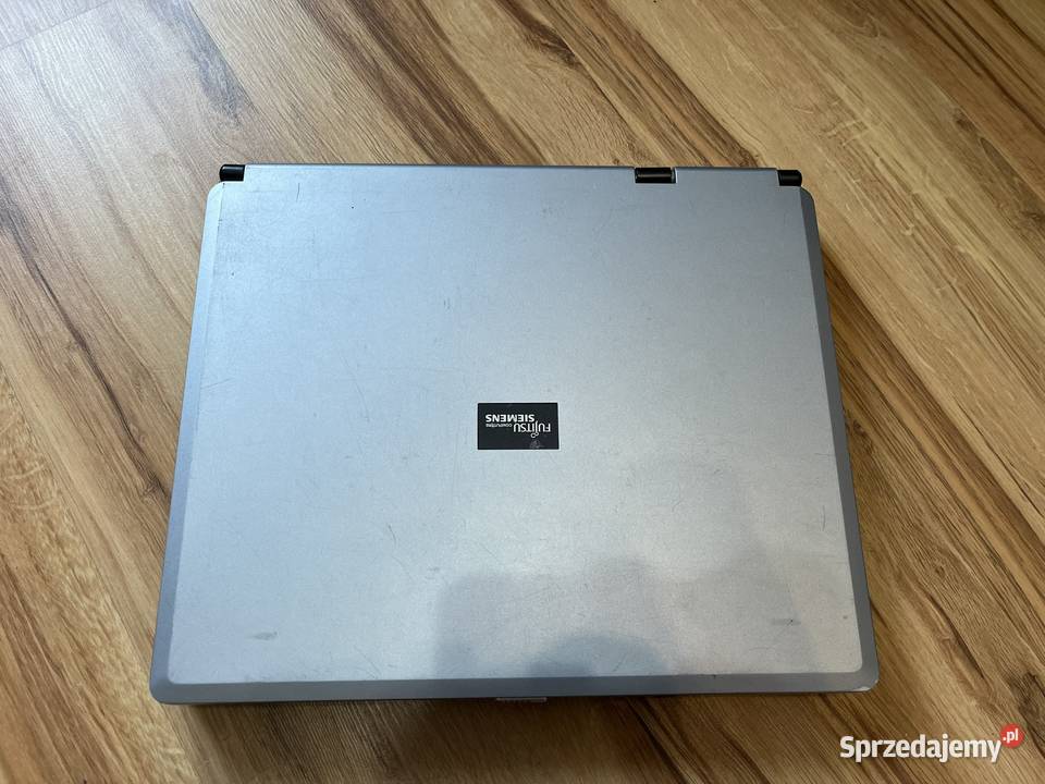 Stary laptop Fujitsu Siemens Amilo Pro V2010 Brzana