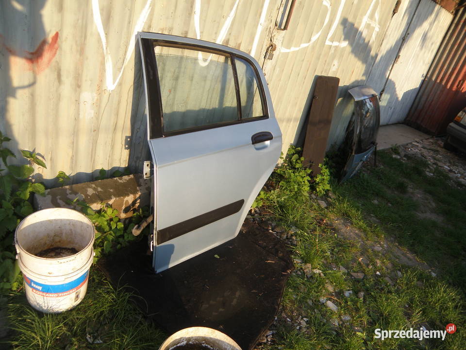 Drzwi lewe tylne lewy tył Hyundai Getz błękitne Drzwi małopolskie