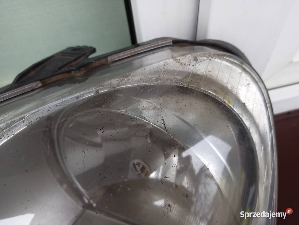 VW Polo 9N IV FL LIFT lampa przednia lewa Sieradz