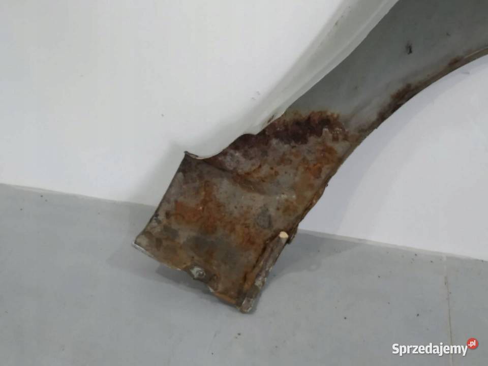 BŁOTNIK B LEWY PRZÓD SREBRNY Z157 Opel Zafira II