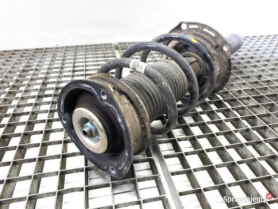 AMORTYZATOR LEWY PRZÓD ZE SPRĘŻYNĄ VW PASSAT B8