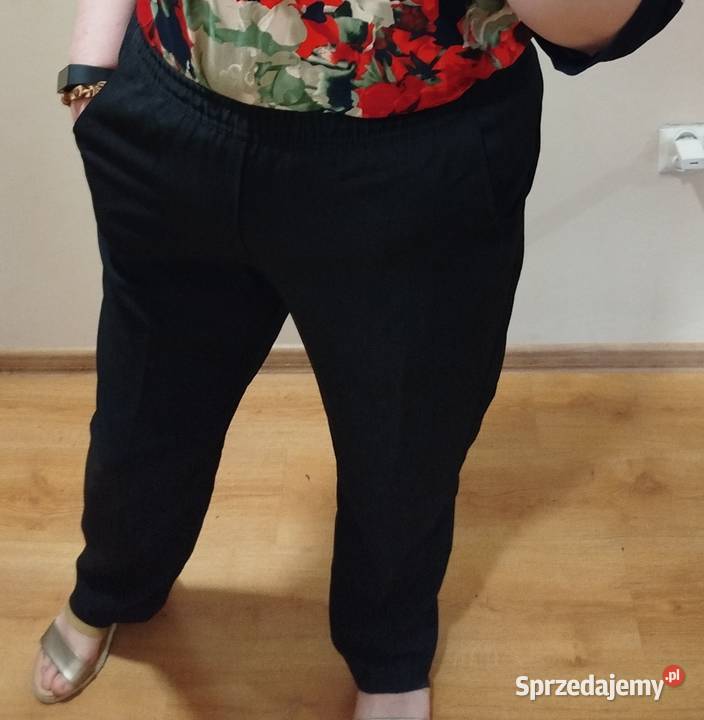 Eleganckie spodnie rozmiar 4850 na szersze czarny Biecz