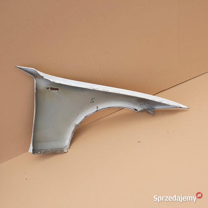 BMW 1 E87 BŁOTNIK LEWY PRZÓD Trzciel