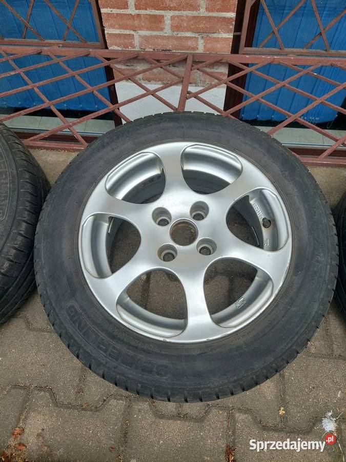 Felgi aluminiowe z oponam Toyota Corolla E11 OZ Wrocław sprzedam