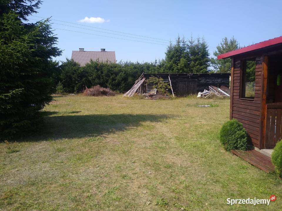 Działka budowlana z budynkami Świętajno
