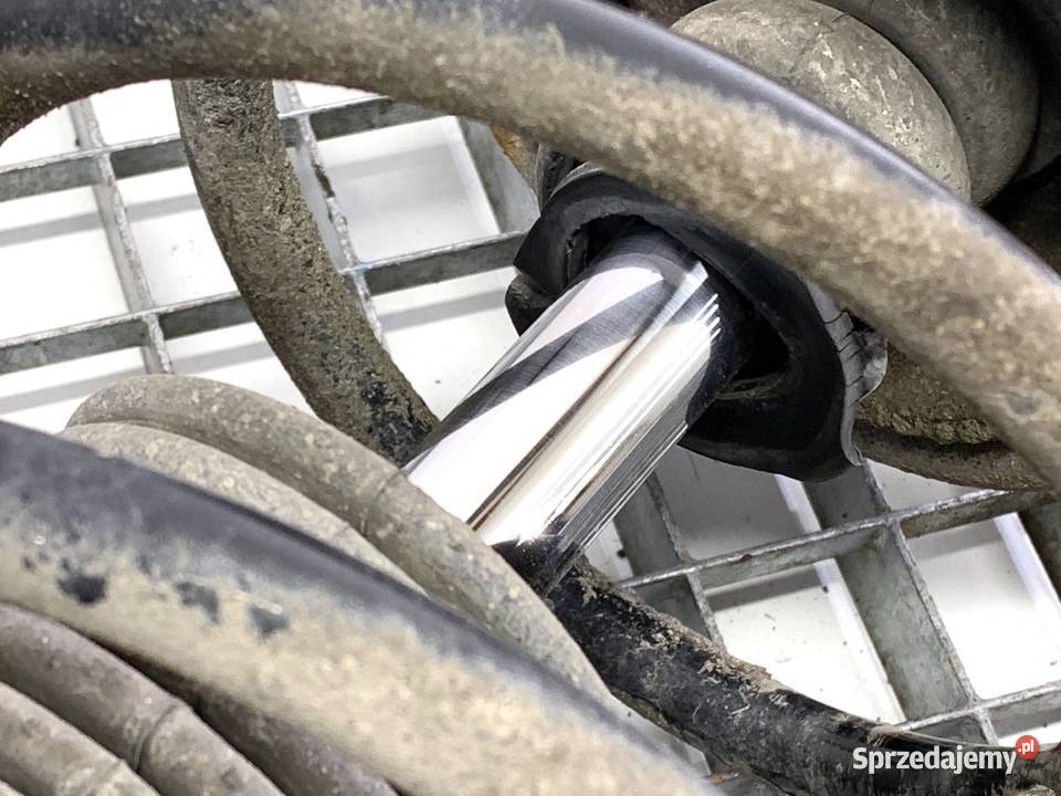 AMORTYZATOR PRAWY PRZÓD ZE SPRĘŻYNĄ RENAULT