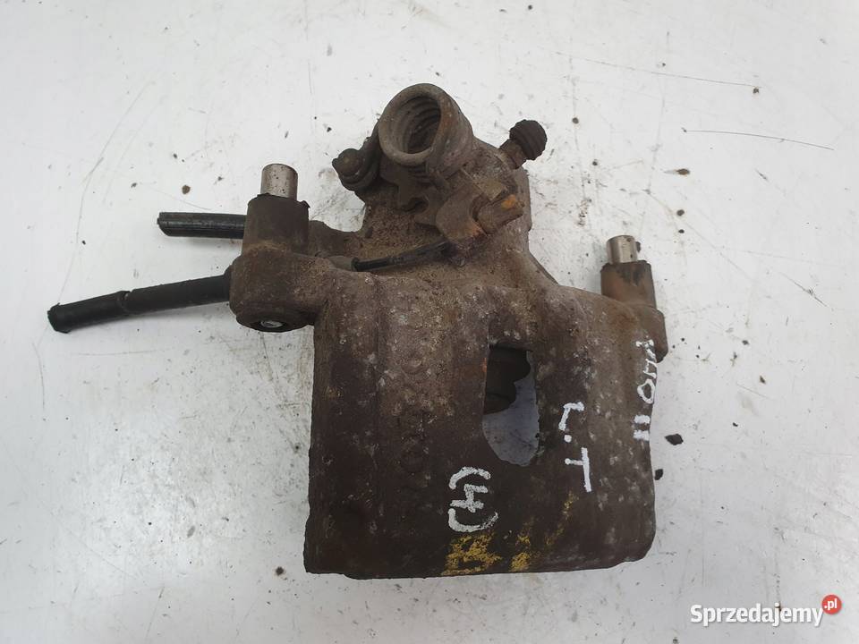 Volvo V40 II TYLNY ZACISK HAMULCOWY lewy tył