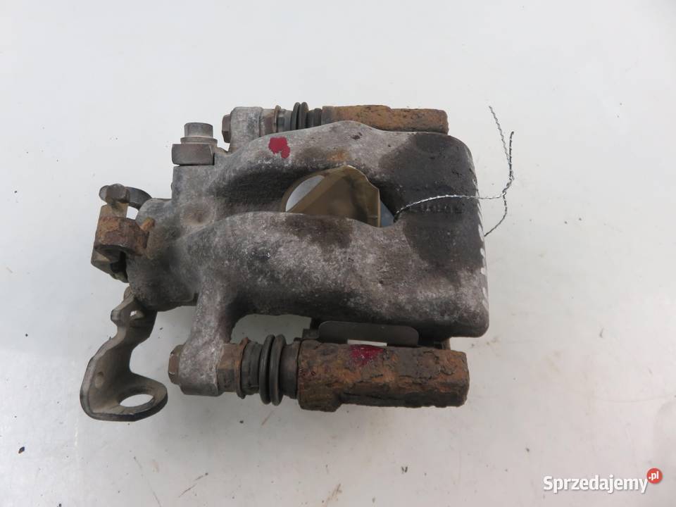 ZACISK PRAWY TYŁ OPEL ASTRA III H