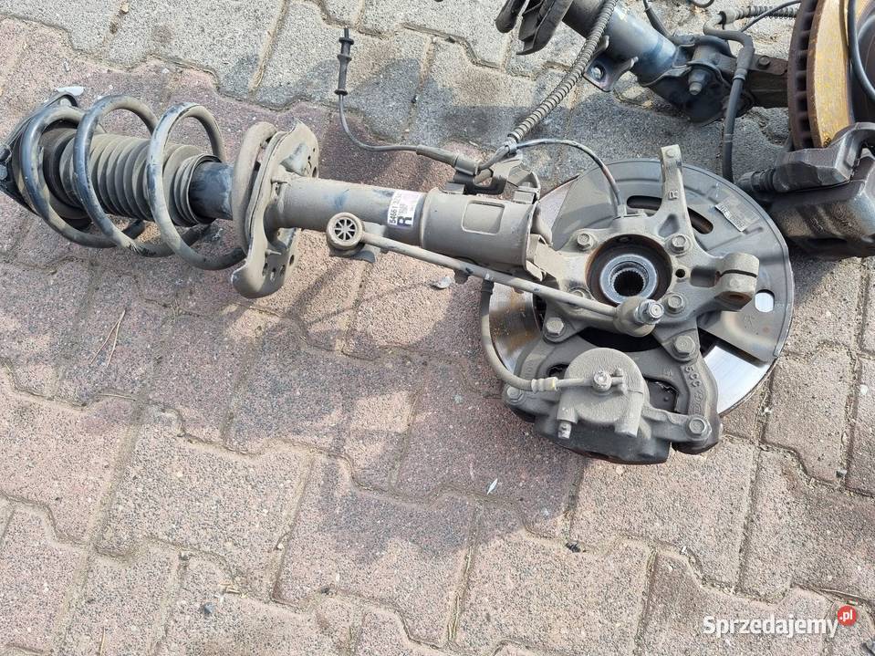 MCPERSON AMORTYZATOR SPRĘŻYNA ZWROTNICA PRAWY osobowe Części samochodowe