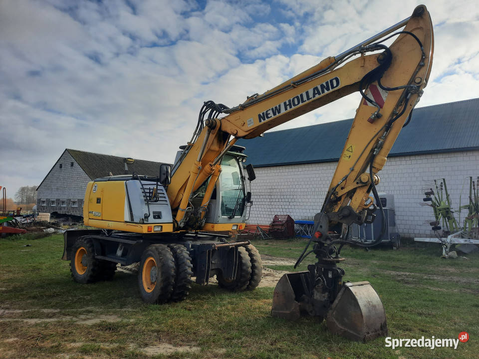 Koparka kołowa HOLLAND WE150C 4x4 2012 r 153 t 7938h