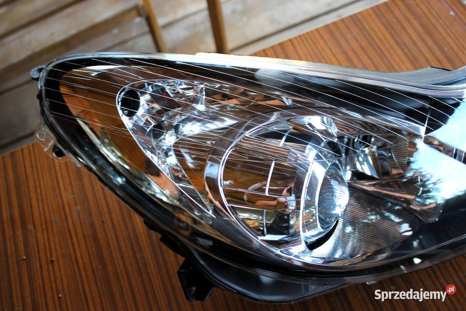 Komplet lamp LP soczewka Opel Corsa D 20062011 osobowe Lampy przednie Kielce