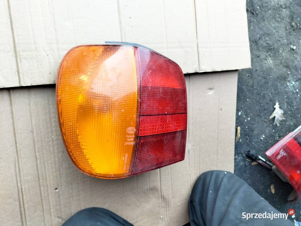 VW POLO MK3 6N WKŁAD LAMPY LAMPA TYŁ TYLNA LEWA osobowe Lampy tylne lubelskie Kamień-Kolonia