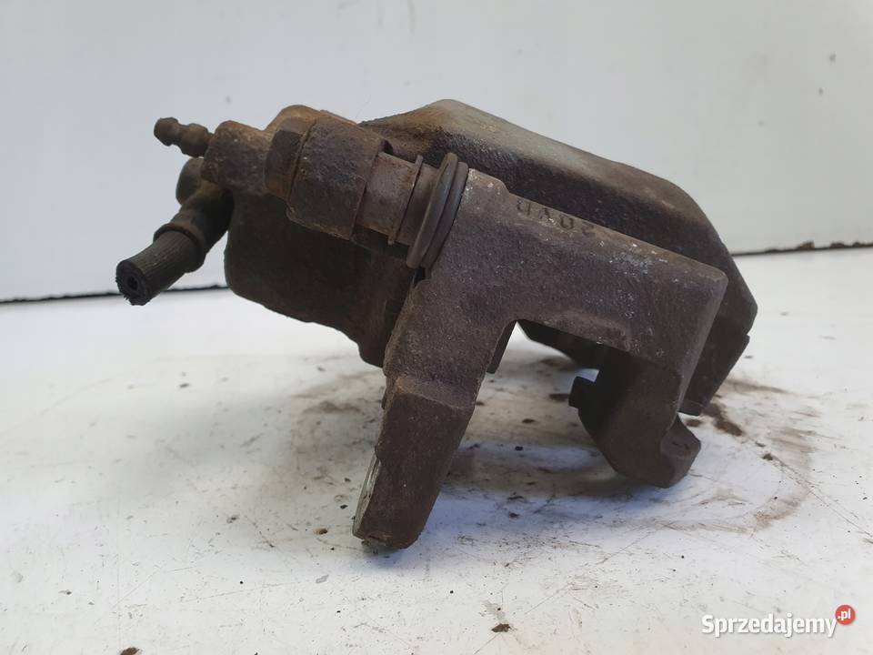 Toyota IQ PRAWY PRZEDNI ZACISK HAMULCOWY przód osobowe Układ hamulcowy lubelskie Rudka