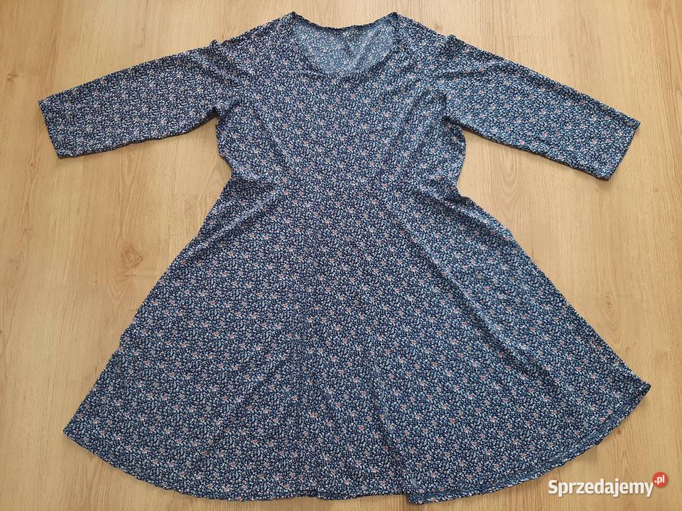 Zwiewna sukienka w kwiatki Moda i Styl Rawicz