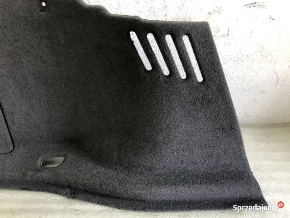 BOCZEK BAGAŻNIKA LEWY 7149199 BMW E65 LIFT Tapicerki samochodowe