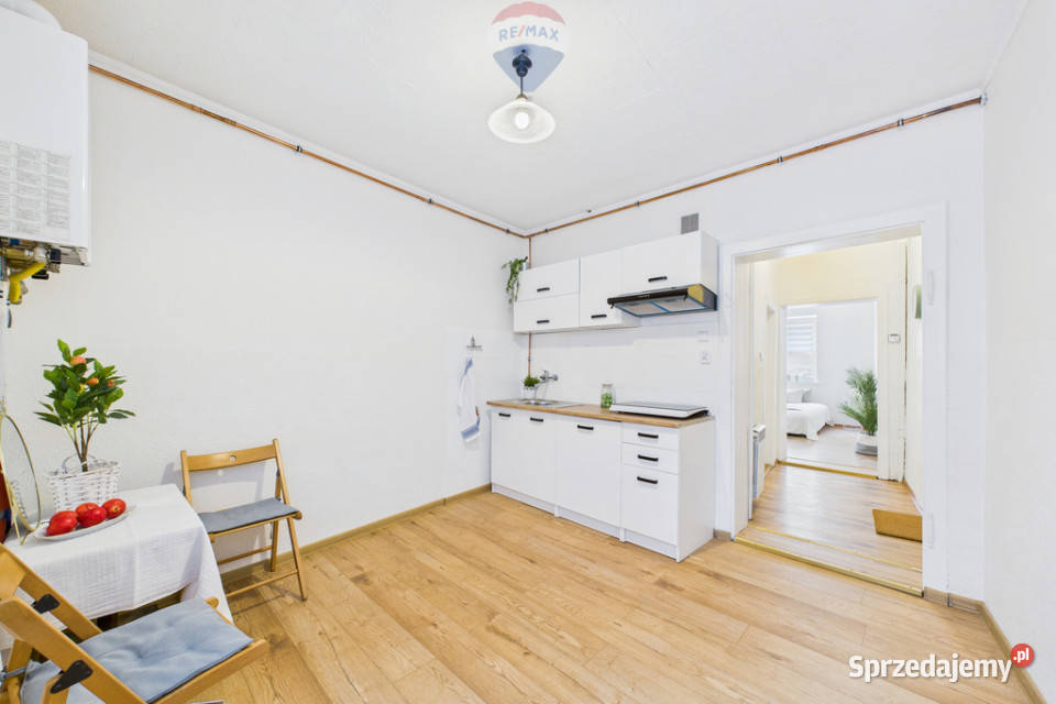 Kamienica mieszkania 2 lokale usługowe 3 garaże 2644zł/m2 Ostrzeszów