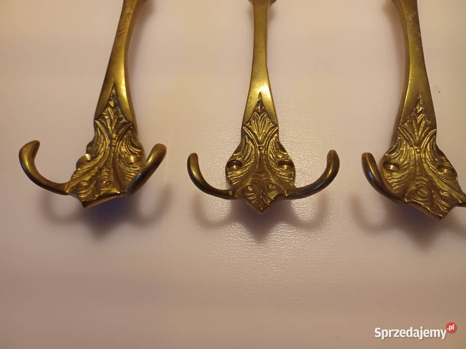 Komplet czterech dużych wieszaków Mosiądz Poznań