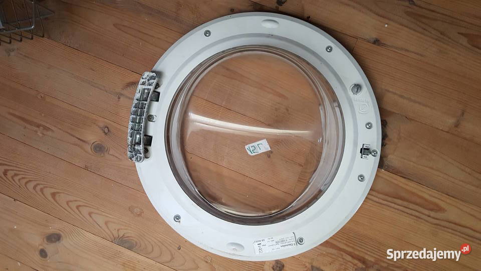 Duże srebrne drzwiczki pralki Electrolux model Części i Akcesoria