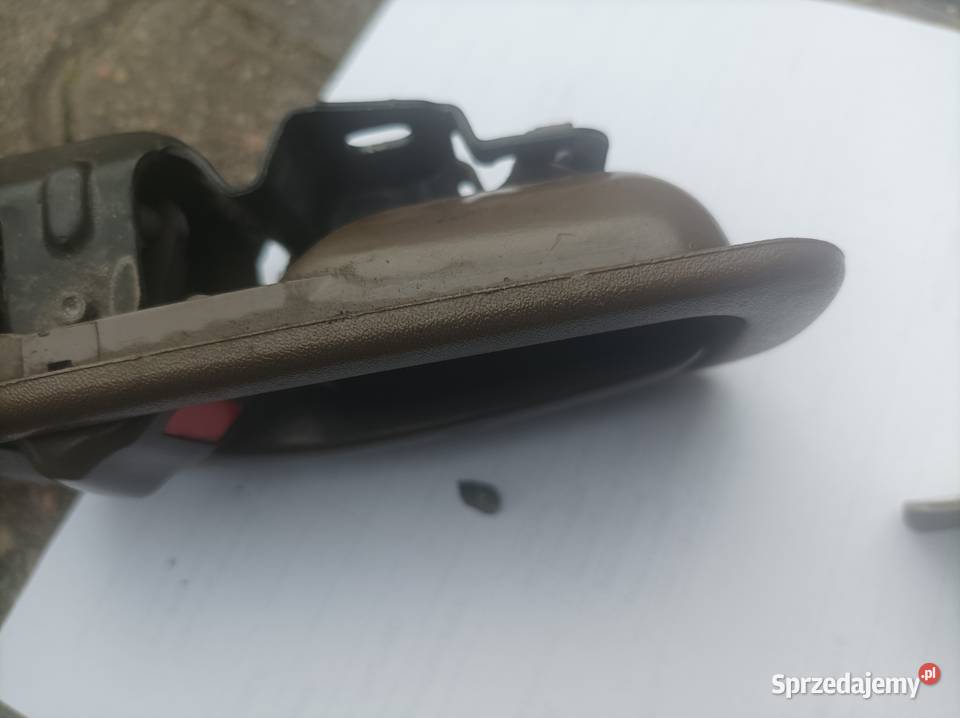 Klamka wewnętrzna Toyota Camry 9195r bezowa osobowe wielkopolskie