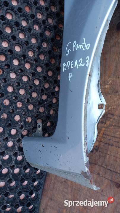 FIAT GRANDE PUNTO EVO BŁOTNIK PRZÓD PRAWY 457B osobowe Błotniki