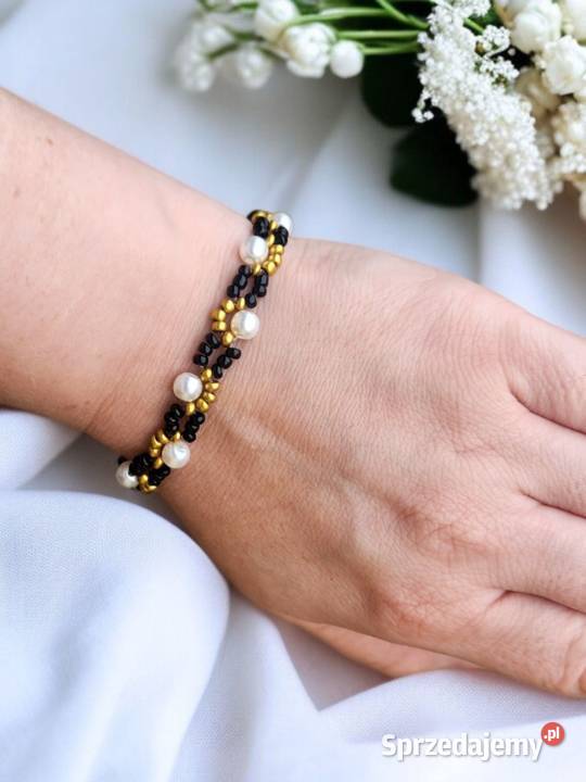 Bransoletka perłowa z czarno złotymi koralikami Bransoletki