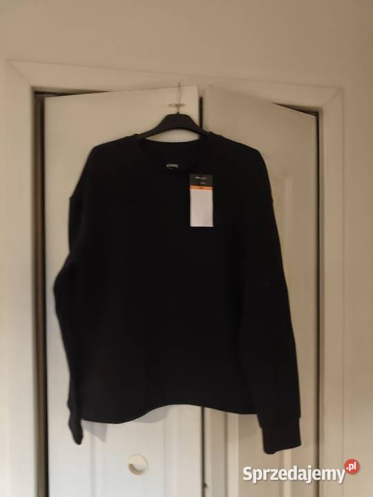 Sprzedam bluzę chłopca rozmiar 170 czarny Bluzy Konin