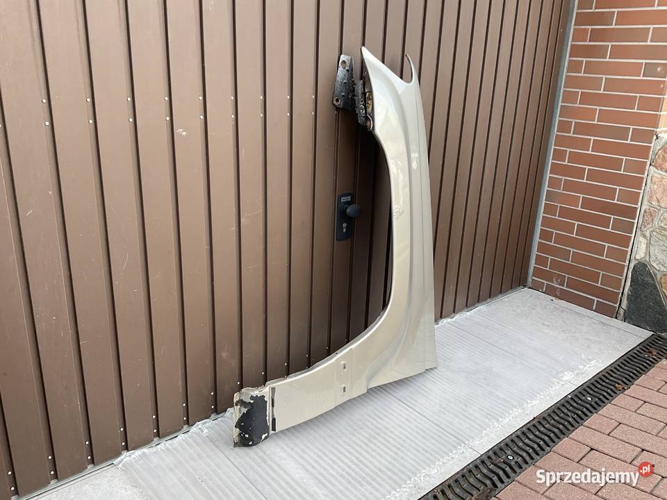 JEEP GRAND CHEROKKE II 9904 BŁOTNIK LEWY PRZÓD Pleszew