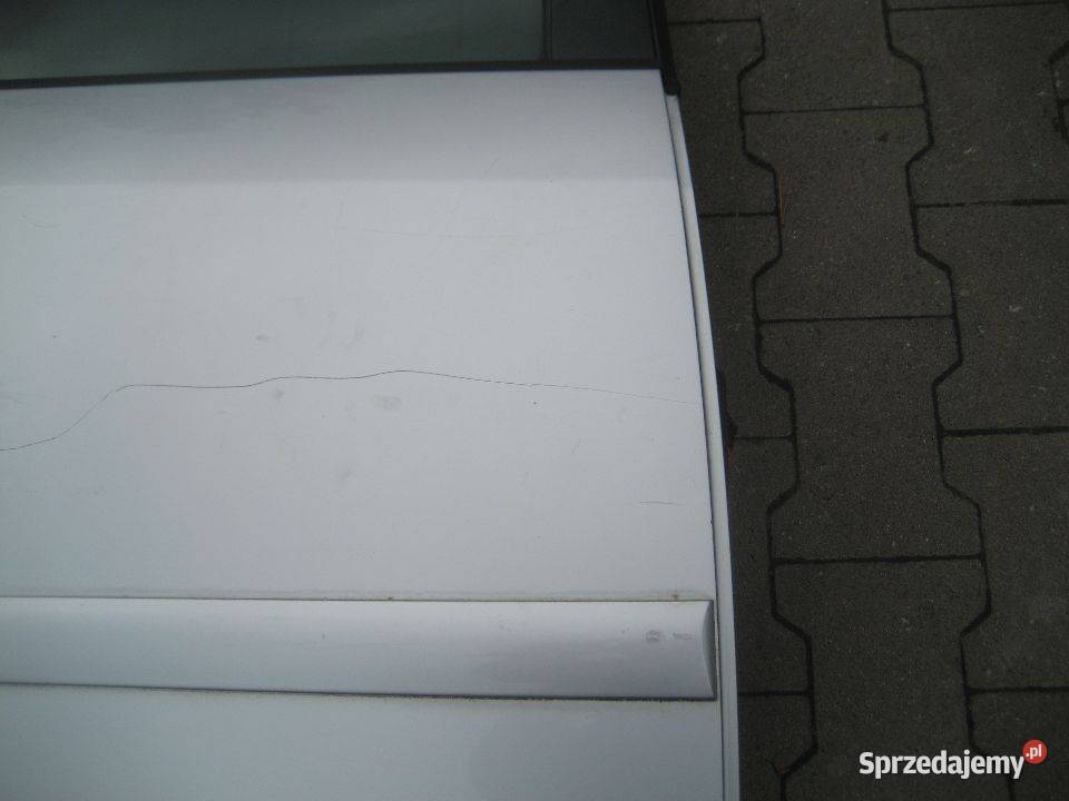 vw touran 0309r drzwi tył prawe kod lakieru LA7W Rakoniewice