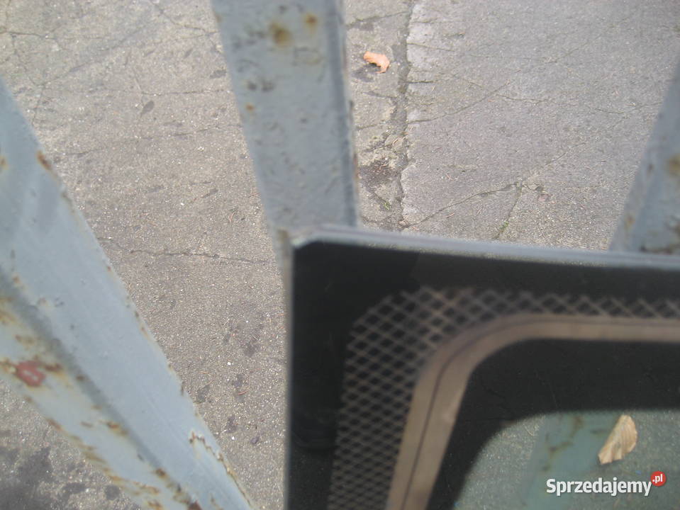 bmw g11 g12 1520r szyba tył zielona uszkodzona