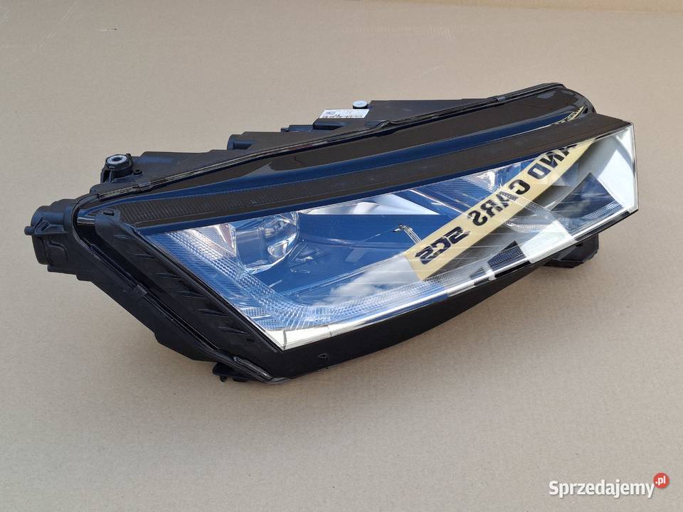 SKODA OCTAVIA IV 4 REFLEKTOR PRAWY LAMPA PRAWA Bieleń