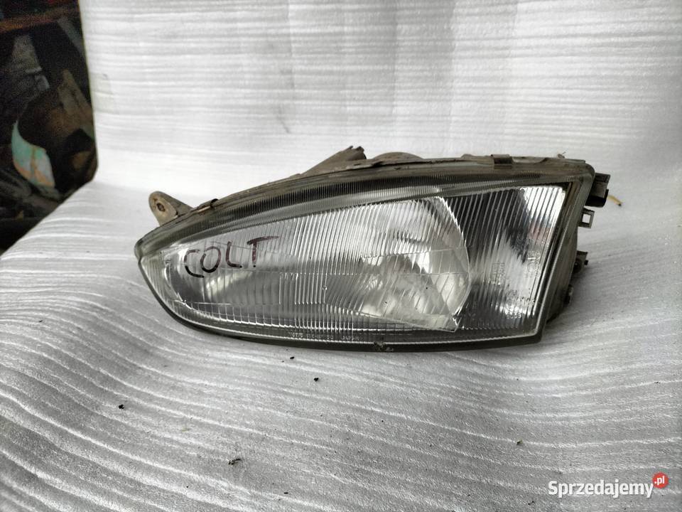 LAMPA PRZEDNIA PRZÓD LEWA MITSUBISHI COLT 5 9698 Kamień-Kolonia