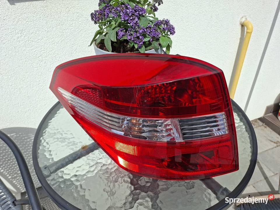 Lampa Tylna Lewa Renault Laguna lll 3 kombi OE Słupno sprzedam
