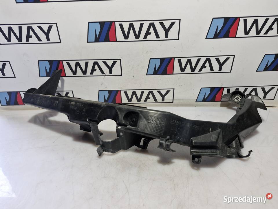 7138401 BMW E90 E91 ŚLIZG MOCOWANIE LAMPY LEWY