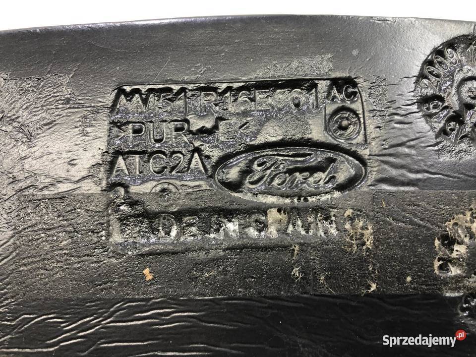 WYGŁUSZNIE BŁOTNIKA AM51R16E561 LEWE FORD C II osobowe
