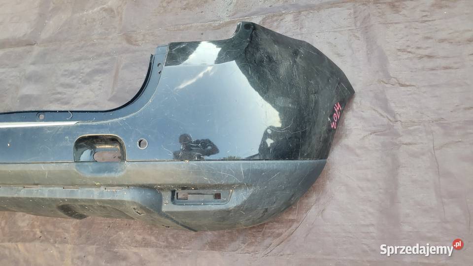DACIA DUSTER ZDERZAK TYLNY TYL CHROM 850220033r