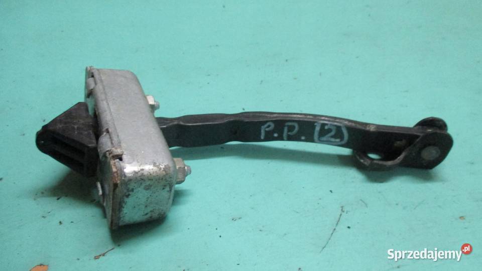 MAZDA CX7 08r ogranicznik drzwi prawy przód