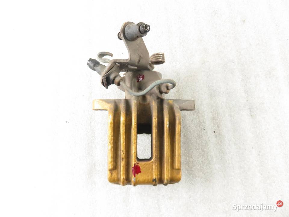 ZACISK PRAWY TYŁ VW GOLF VI 16 TDI