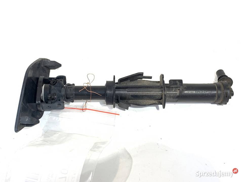 SPRYSKIWACZ REFLEKTORA LEWY PRZÓD VW GOLF VII