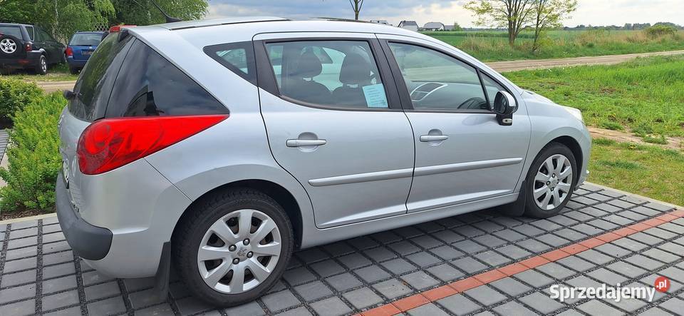 Peugeot 207 SW 16HDI 109 Panorama srebrny Marszew
