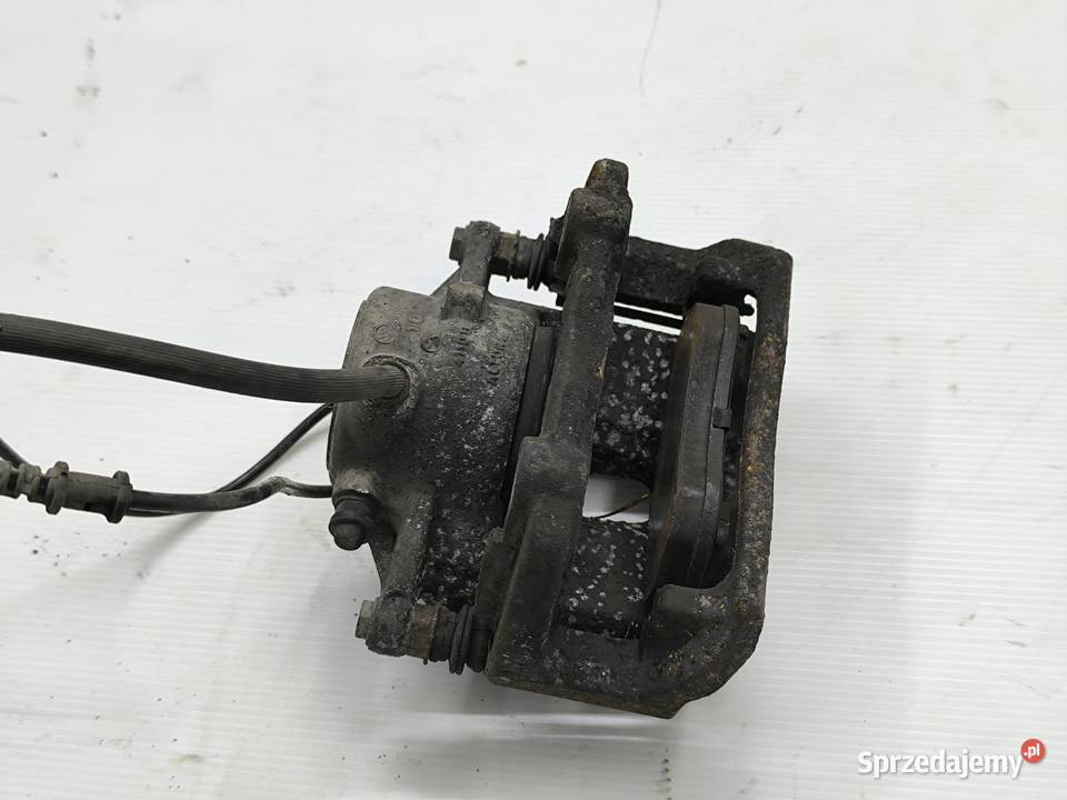 ZACISK PRAWY PRZÓD MERCEDES EKLASA W212 22 CDI osobowe Zaciski i jarzma